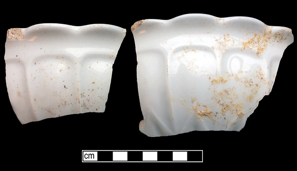 Bowl with arches and scalloped rim. Arches, scallops, loops and lobes, used in conjunction with vertical panels, became common on white granite in the 1850s (Wetherbee 1996:81). Rim diameter:8.25”,  Vessel #: 102. 18BC56